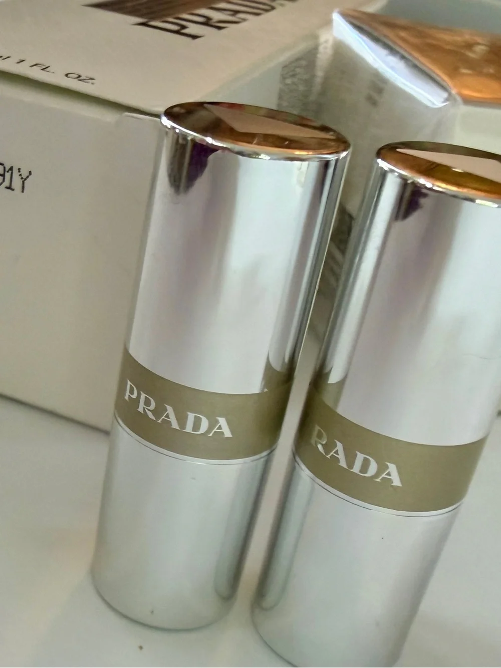 Prada Beauty Bundle NIB: Reveal Foundation, Augmented Skin Cream, 2 Banana balms